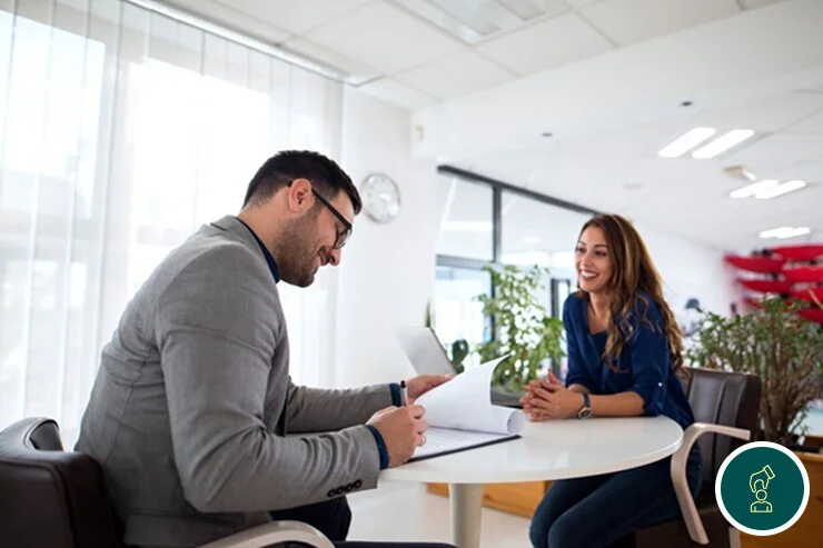 A consultant talking a client through a document
