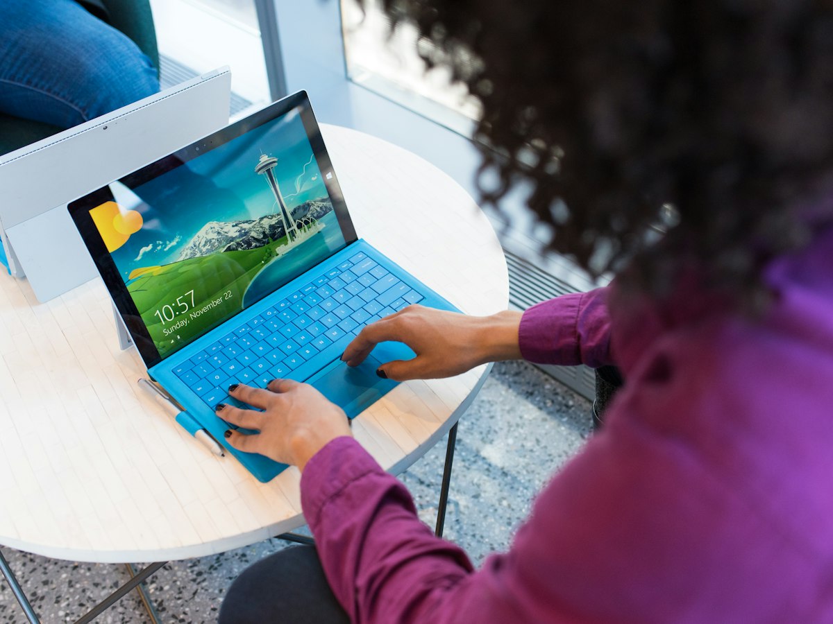 A professional working remotely on a tablet